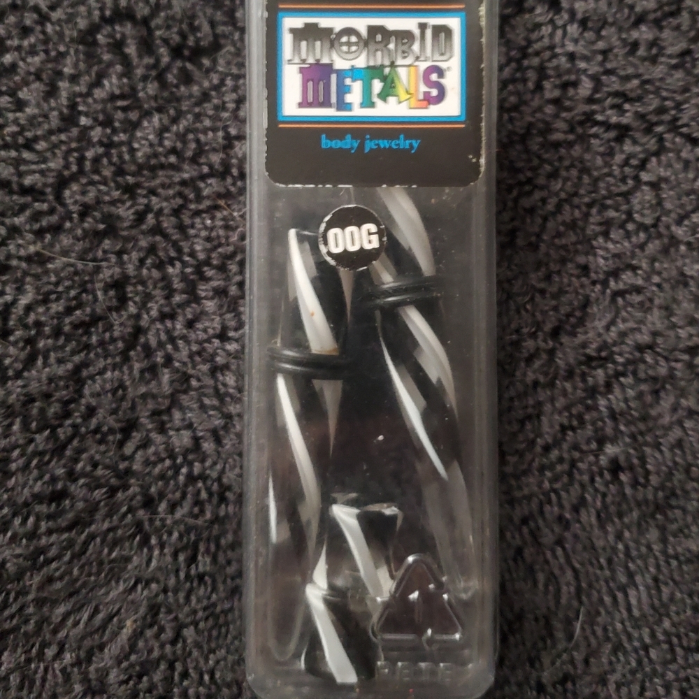 Morbid Metals 4 pk. 2 tapers and 2 plugs.